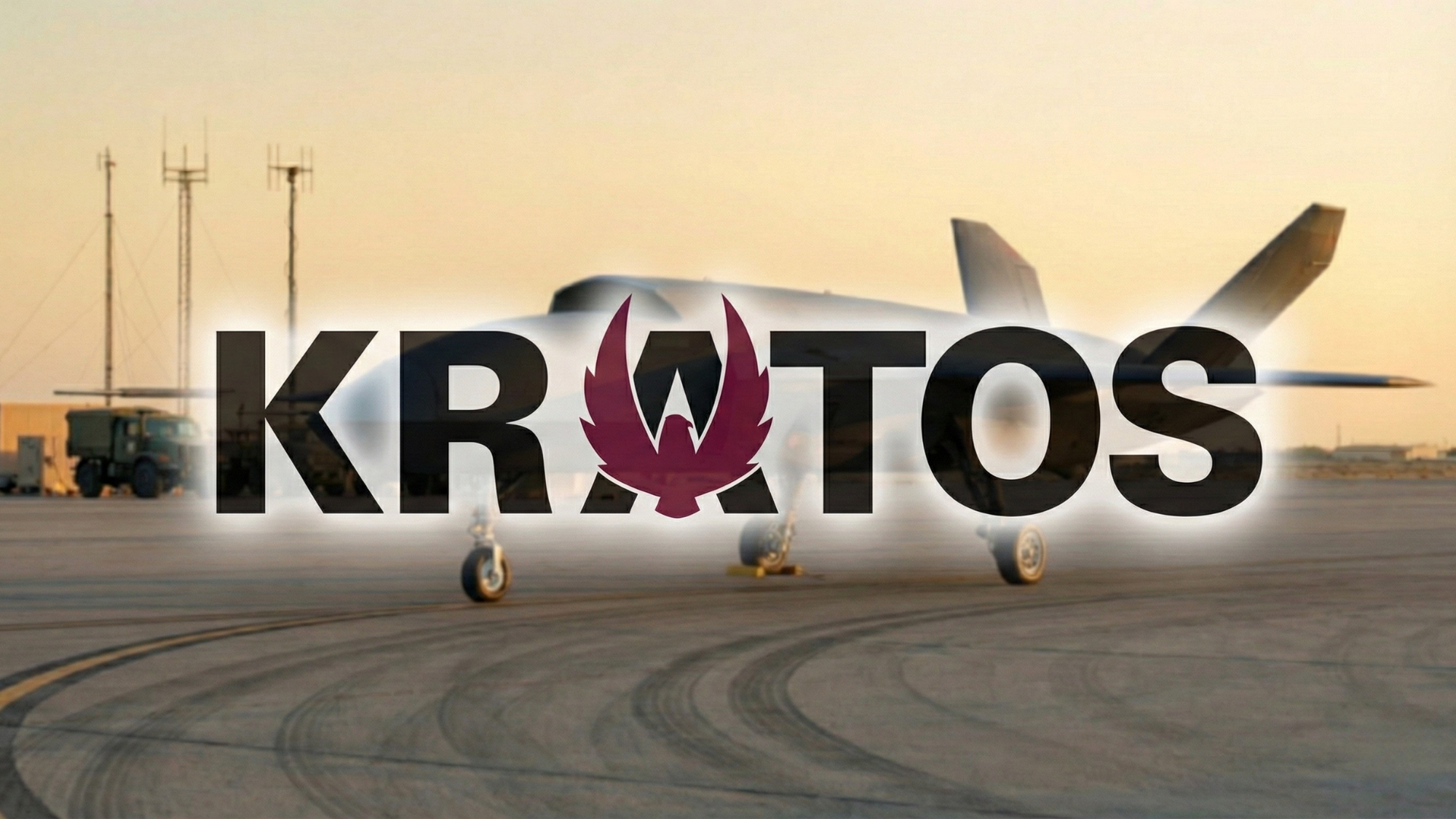 Kratos logo overlaid on an unmanned military drone parked on a runway at sunset, highlighting defense technology growth.