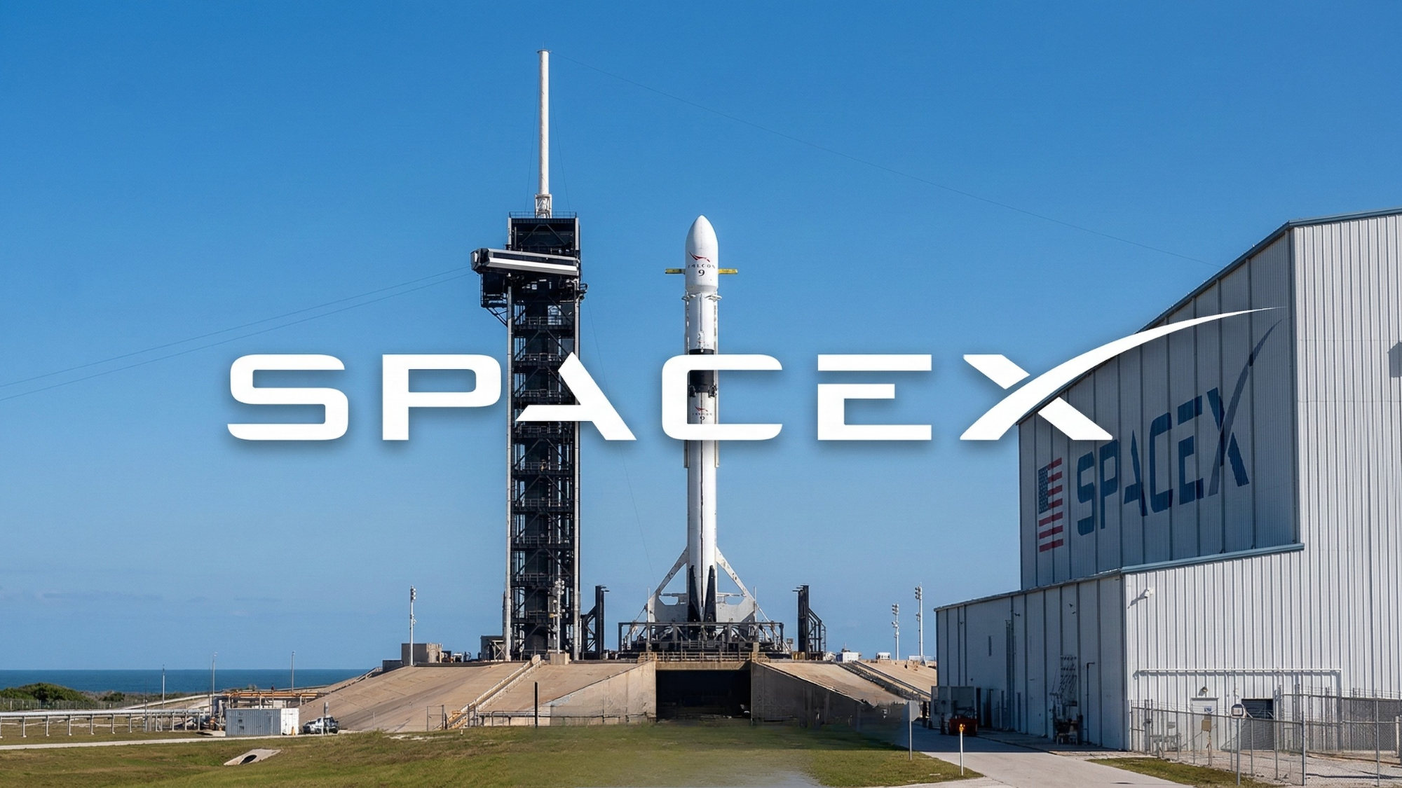 SpaceX rocket on coastal launch pad with large SpaceX branding, illustrating SpaceX ahead of its anticipated IPO.