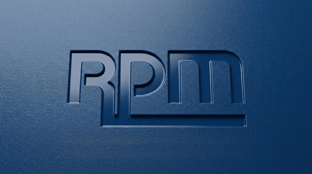 The RPM International logo embossed on a dark blue, textured surface.