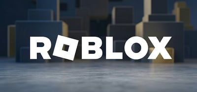 Roblox logo displayed in white text against a blurred three-dimensional block cityscape background.