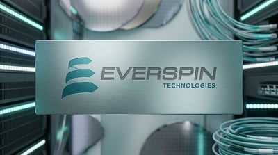 Everspin Technologies logo on a brushed metal plaque set against a data center background.