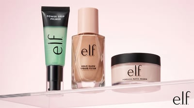 Three e.l.f. Beauty cosmetics products sit on a shelf.