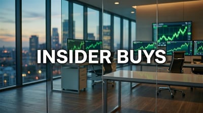 Text reading "Insider Buys" overlaid on a financial trading office with stock charts on monitors.