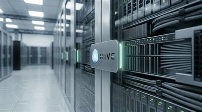HIVE Digital Technologies logo displayed on a server rack inside a data center facility.