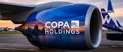 Copa Holdings logo displayed on a jet engine of a Copa Airlines aircraft on the tarmac.