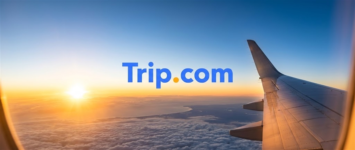 Trip.com logo overlaid on a view of an airplane wing above clouds at sunrise.