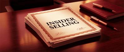 A formal document labeled "Insider Selling" rests on a wooden desk beside a pen and notebook.