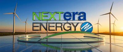 NextEra Energy logo displayed against a backdrop of wind turbines and solar panels at sunset.
