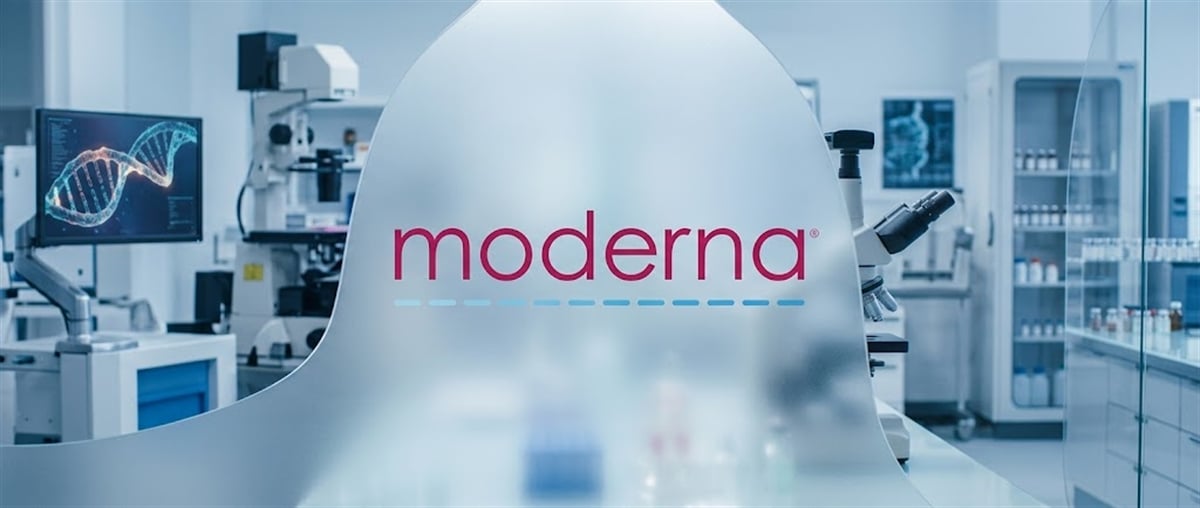 Moderna logo displayed on frosted glass in a laboratory setting with microscopes and equipment visible.