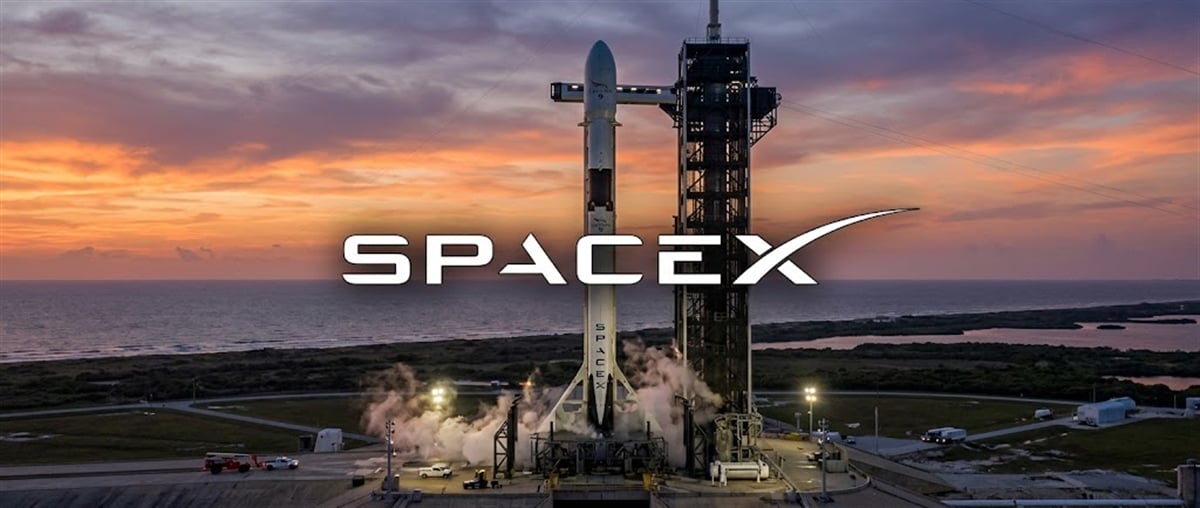 SpaceX logo overlaid on a Falcon 9 rocket standing on the launch pad at sunset.