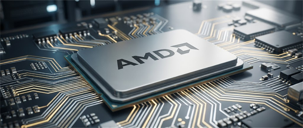 AMD logo on a computer chip placed on a circuit board with illuminated gold traces.