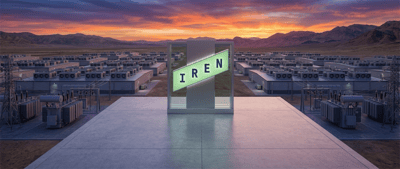 Illuminated IREN logo stands amid rows of data center buildings and electrical infrastructure at sunset in a desert setting.