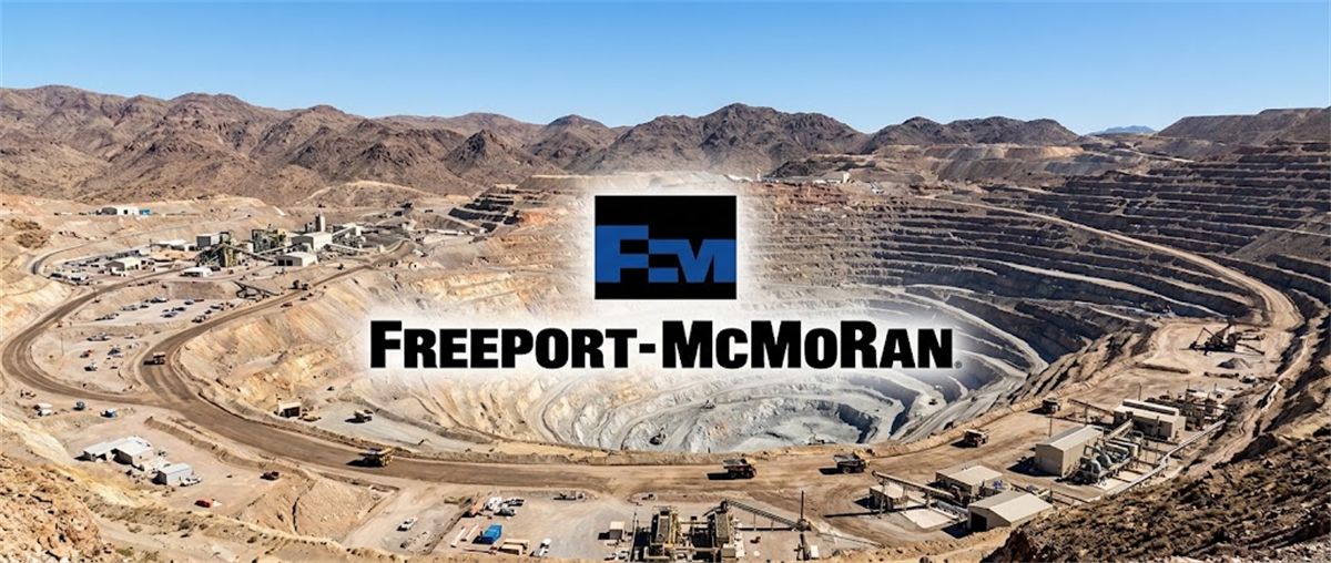 Aerial view of an open-pit copper mine with the Freeport-McMoRan logo overlaid on the desert landscape.