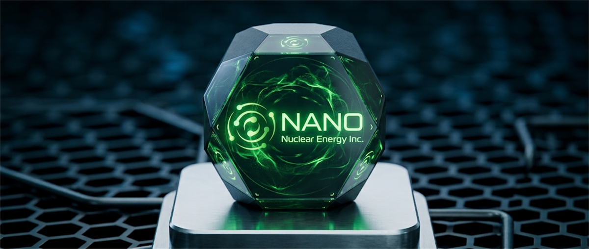 Illuminated multi-faceted sphere displaying the NANO Nuclear Energy Inc. logo with green glowing accents on a metallic stand.