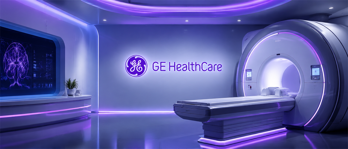 GE HealthCare logo displayed on a wall beside an MRI scanner in a futuristic imaging suite.