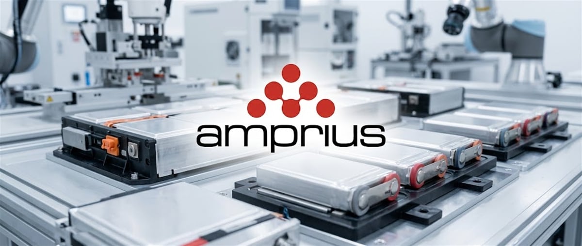 Amprius Technologies logo displayed over a battery manufacturing facility with lithium-ion battery packs on assembly equipment.
