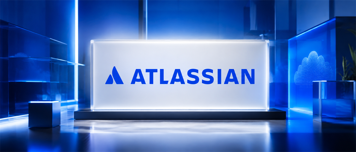 Atlassian logo displayed on an illuminated glass panel in a blue-lit setting with a cloud icon in the background.