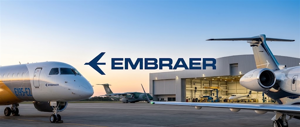 Embraer logo displayed among E195-E2 and Praetor aircraft parked near a hangar on an airfield.