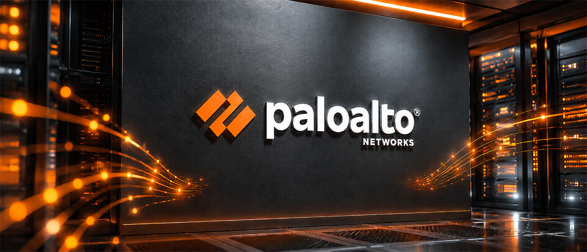Palo Alto Networks logo displayed on a dark wall in a data center flanked by illuminated server racks.