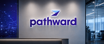Illuminated Pathward logo displayed on a wall in a corporate office reception area with glass doors.