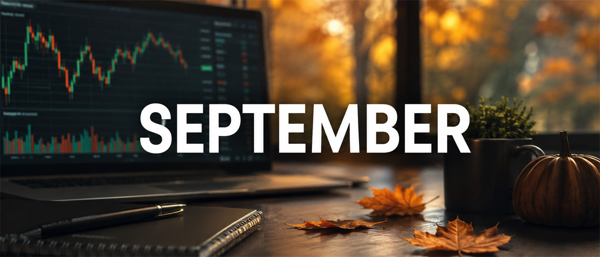 Laptop displaying a candlestick stock price chart on a desk with autumn leaves and the word September overlaid.