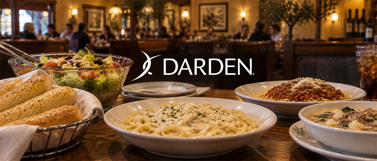 Darden Restaurants logo displayed over a table of pasta dishes, salad, and breadsticks in a restaurant setting.