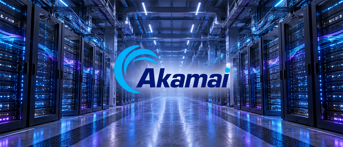 Akamai logo displayed in a data center aisle lined with illuminated server racks.