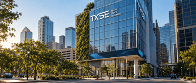 Exterior view of the Texas Stock Exchange (TXSE) building with glass facade, greenery, and city skyline in background.