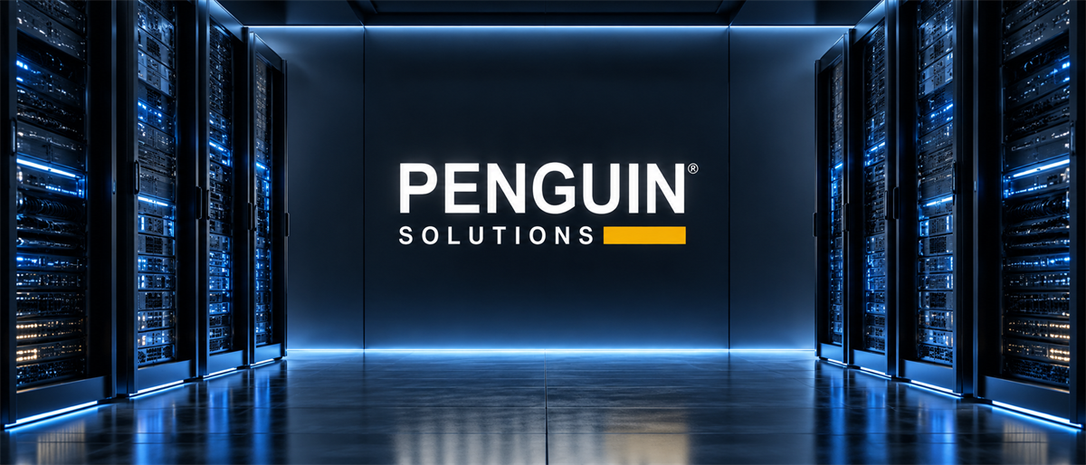 Penguin Solutions logo illuminated on a wall between rows of server racks in a data center.