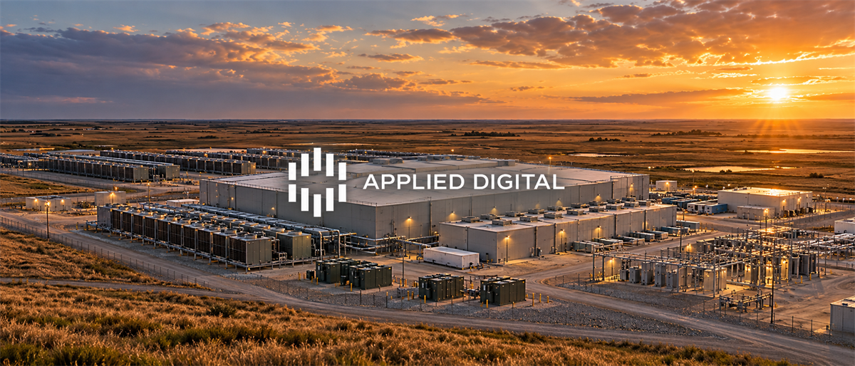 Aerial view of an Applied Digital data center facility with cooling units and buildings at sunset.