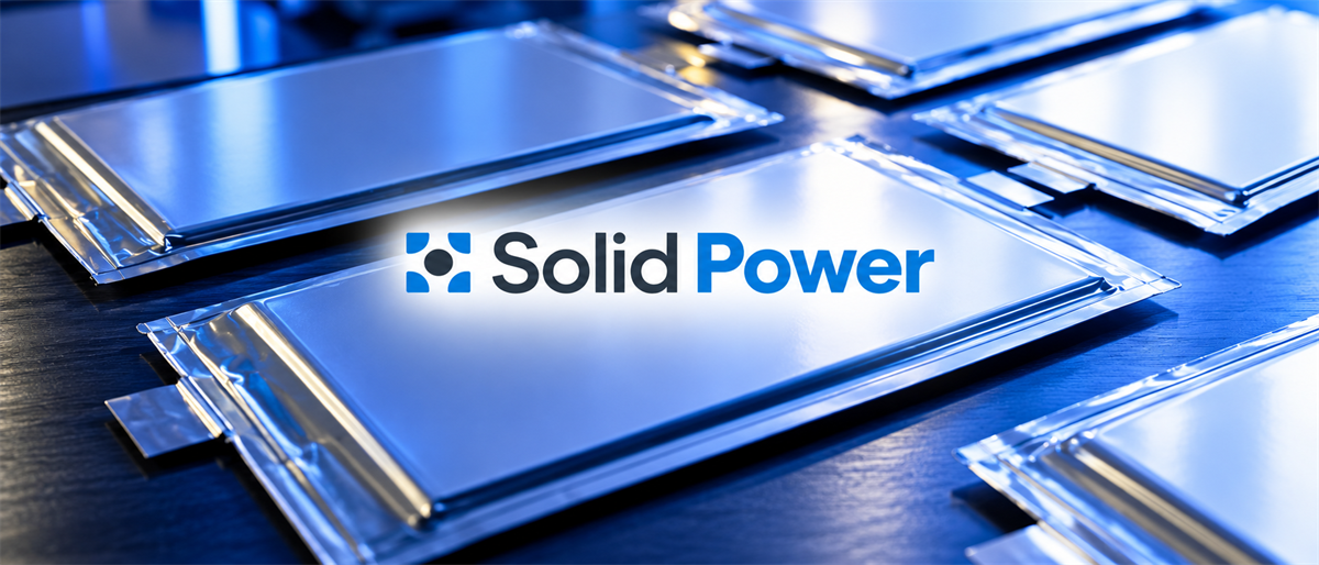 Solid Power logo displayed over an image of flat, solid-state battery cells arranged on a dark surface.