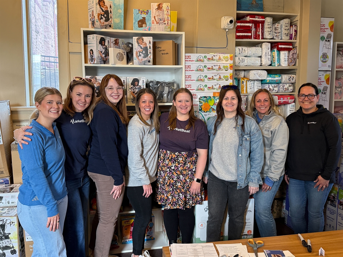 Staff volunteering at the Teddy Bear Den