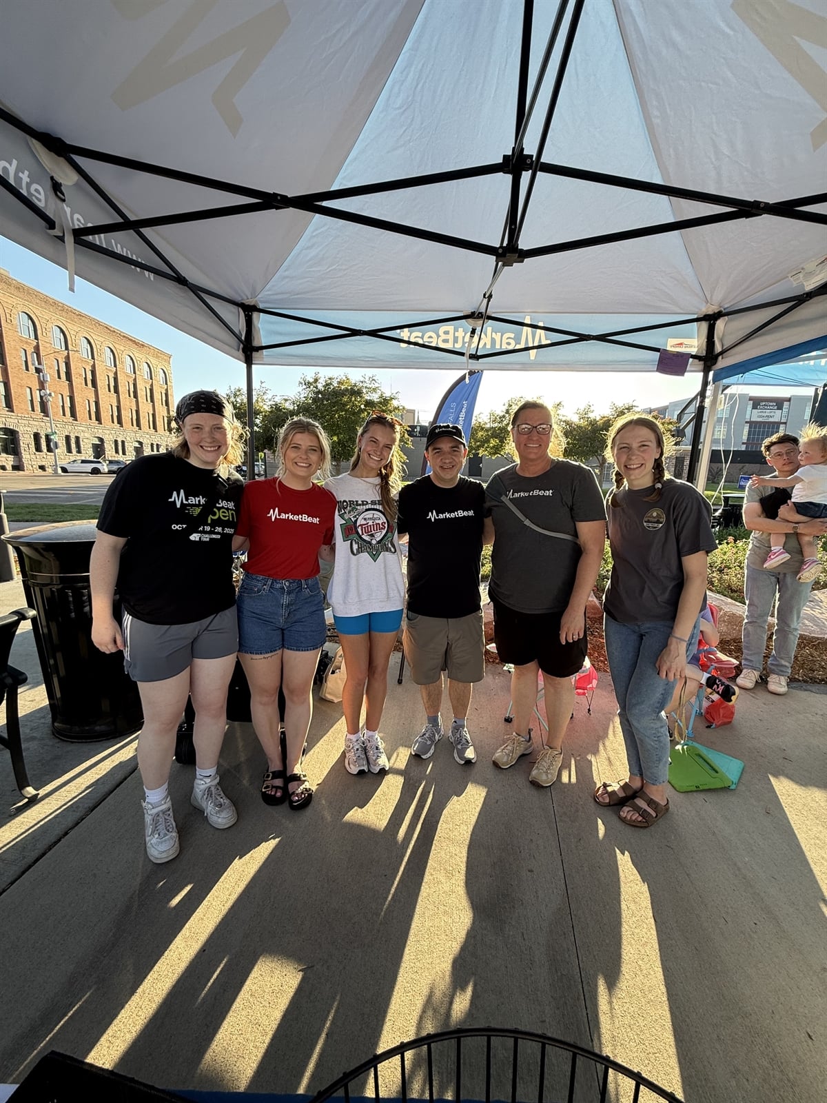MarketBeat team members enjoying a concert at Levitt at the Falls