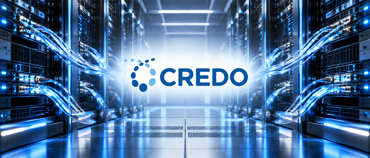 Credo Technology logo displayed in a data center aisle lined with illuminated server racks and fiber cables.