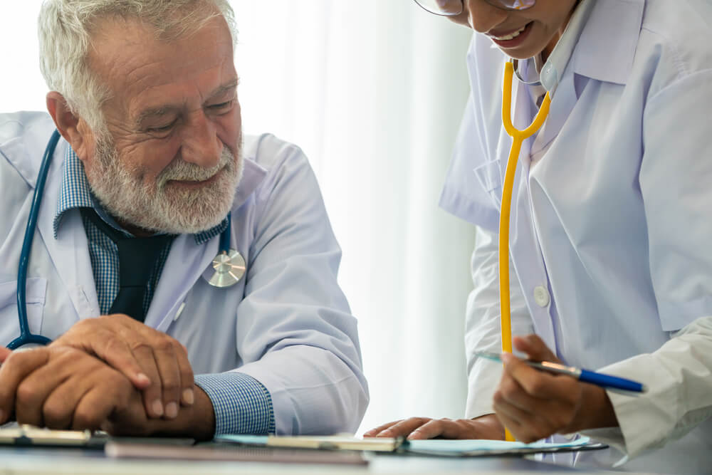 doctors discussing paperwork