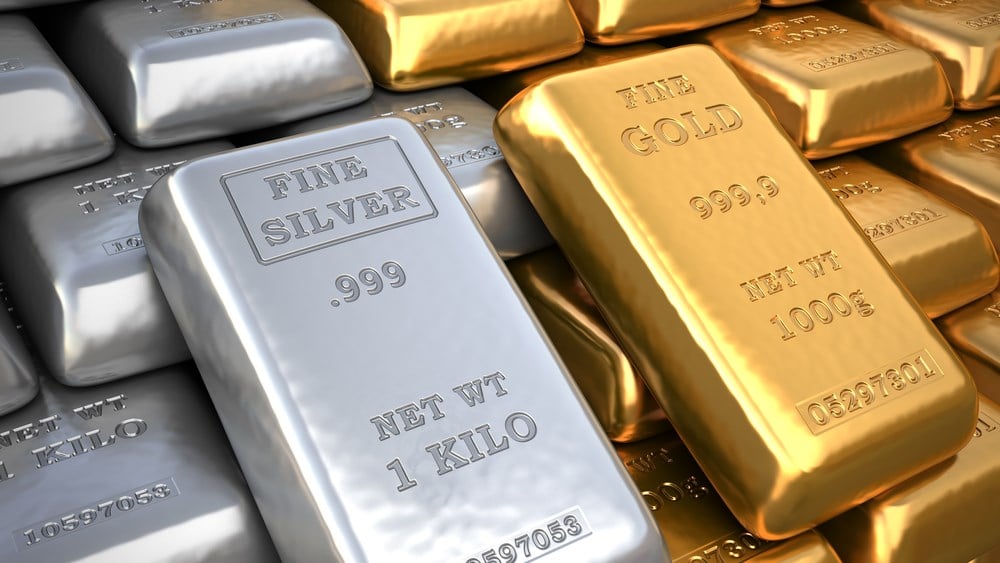 Silver ingot and  gold bullion. How to invest in gold and silver.
