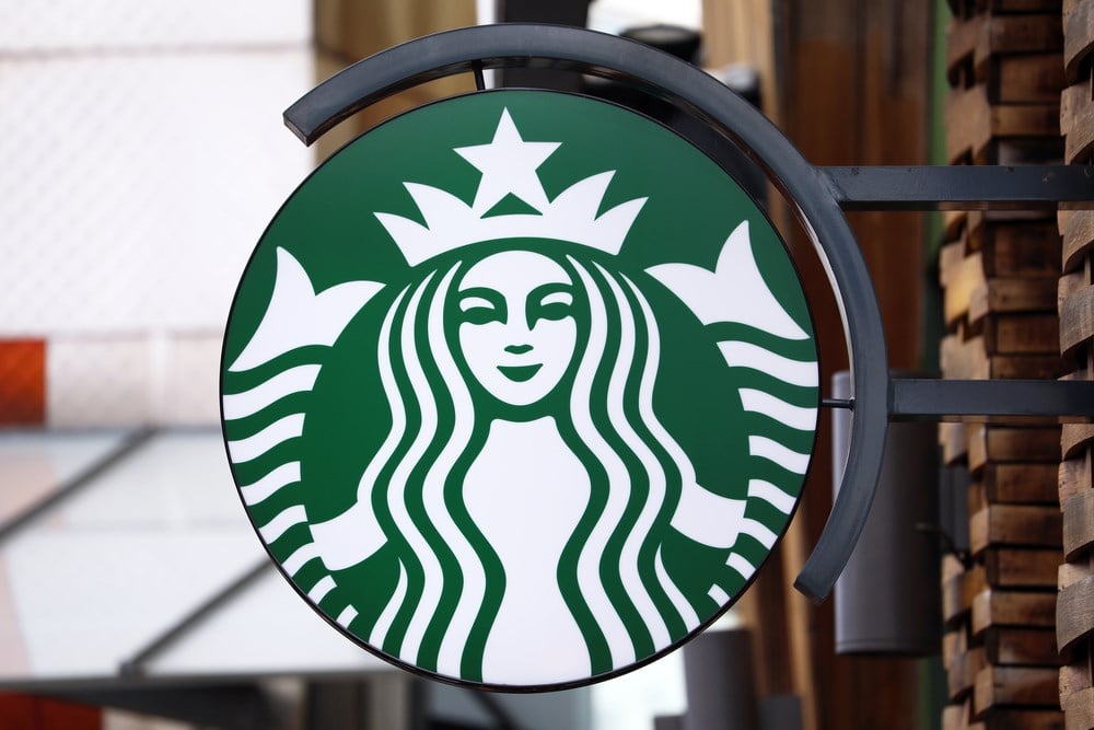 Starbucks logo on a store; learn what's happening with the Starbucks stock price