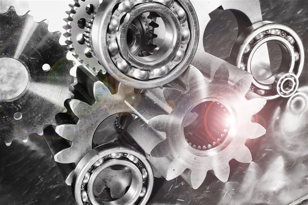 photo with assortment of gears and cogs