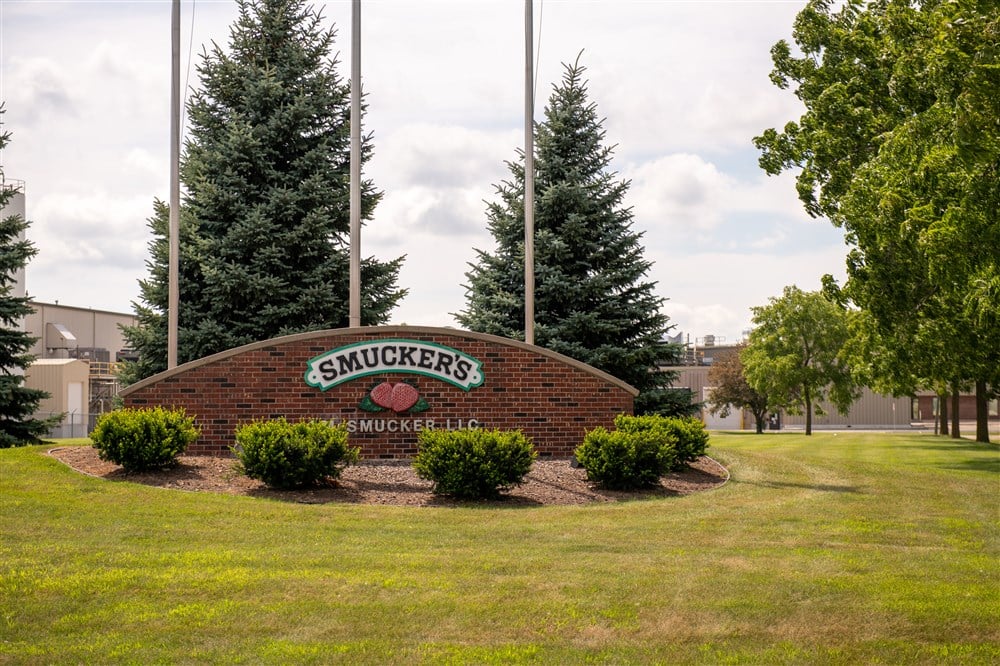 Smucker logo in front of building