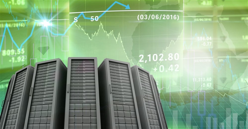 picture of computer servers on animated background showing stock charts