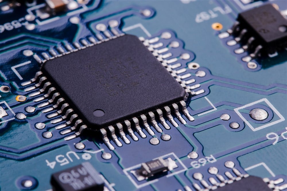 Close-up image of computer chip on circuitboard.