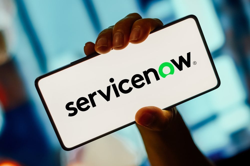 ServiceNow logo displayed on a smartphone screen; servicenow Q3 results