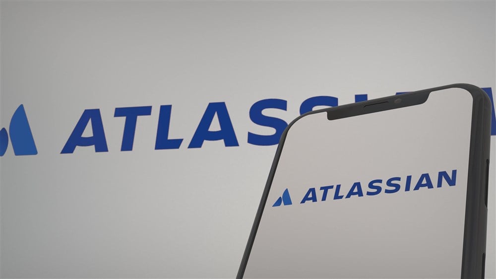 blue atlassian logo on smart phone and white background
