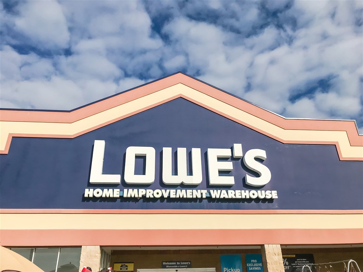 close=up image of lowe's storefront with blue skies