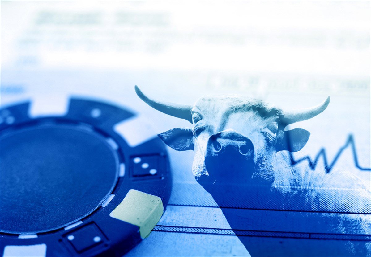 Blue chip and bull with stock market graph; what are blue chip stocks? Learn more