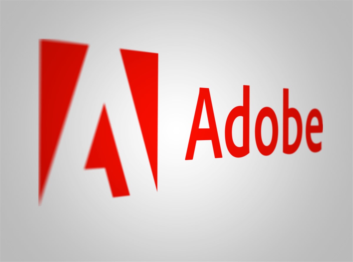 New York, US, May 2023: Adobe logo on white background. Adobe is a multinational software corporation specializing in creative and digital solutions. Illustrative editorial. Selective focus