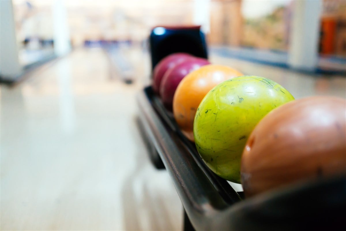 Colorful bowling balls in raw background indoor