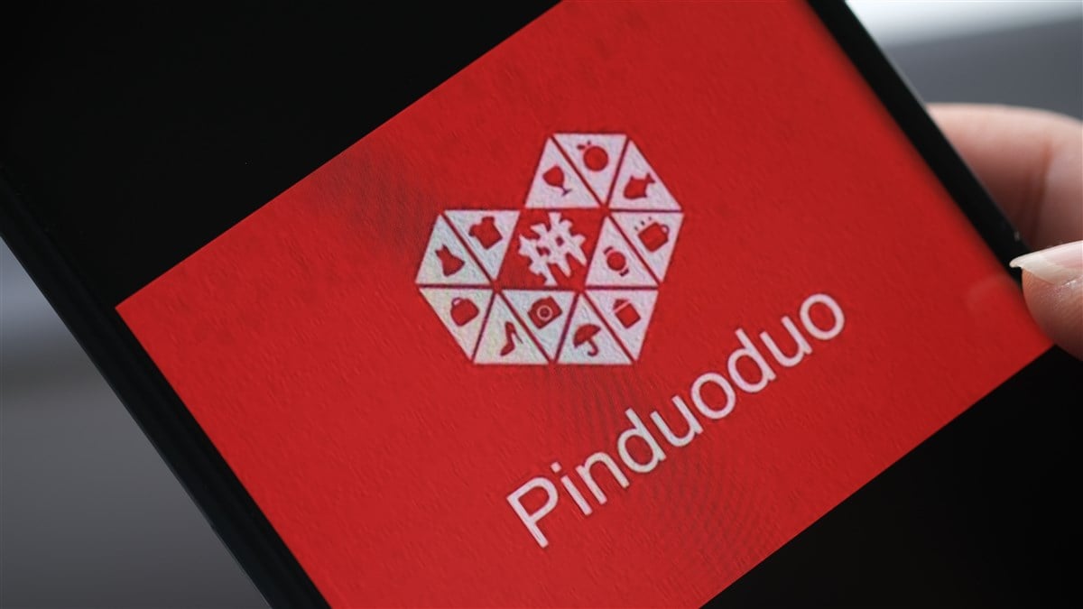 pinduoduo logo on smart phone