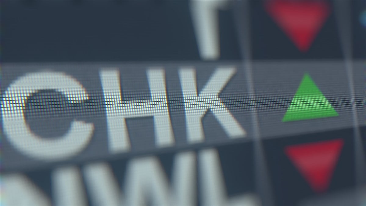 3d image of the ticker symbol CHK on background that looks like stock ticker