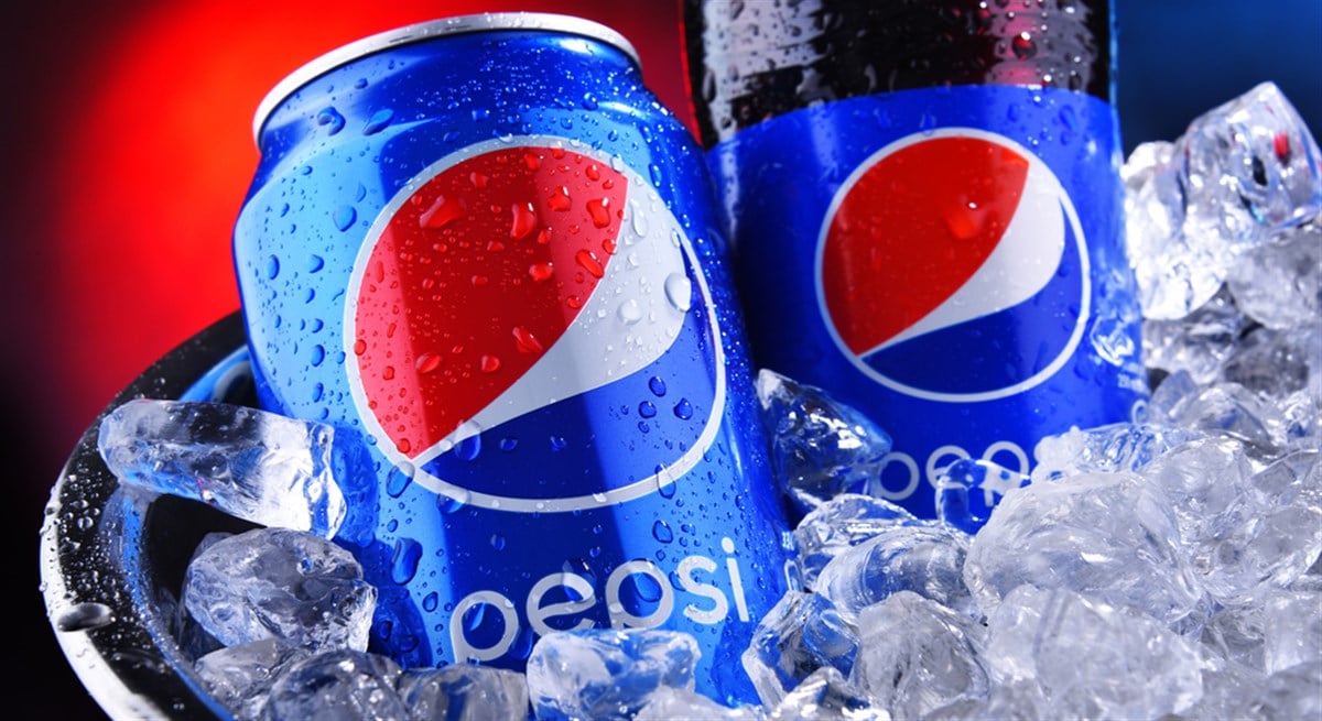 Pepsi can and plastic bottle on ice